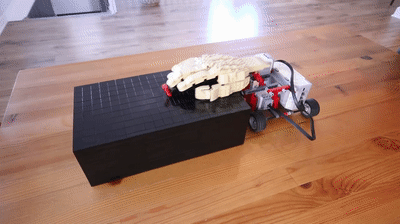 useless button box versus automated lego